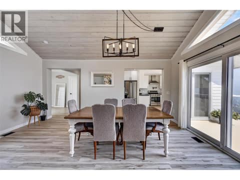 Open concept dining room at 3491 Fenton Road, Glenrosa, West Kelowna