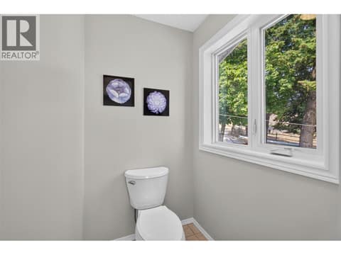 Primary ensuite with soaker tub & a walk-in shower at 3491 Fenton Road, Glenrosa, West Kelowna