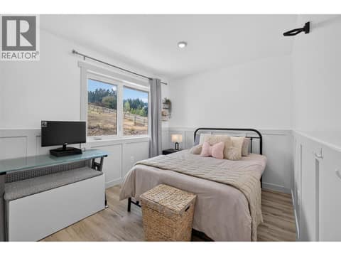 Secondary bedroom on the main level at 3491 Fenton Road, Glenrosa, West Kelowna