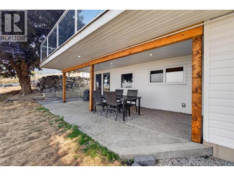 With a covered patio at 3491 Fenton Road, Glenrosa, West Kelowna