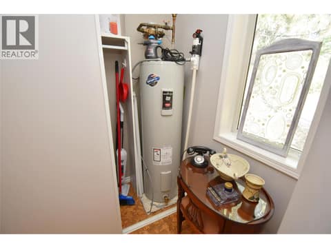 HWT in closet in foyer area at 4800 Heritage Drive Unit# 7, Westmount, Vernon