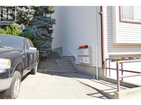 Mailboxes and stairs to the entrance area to Unit # 7 at 4800 Heritage Drive Unit# 7, Westmount, Vernon