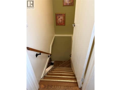 Shared entrance at front entry with stairs to basement at 220 Prior Road S Unit# 1, Rutland South, Kelowna