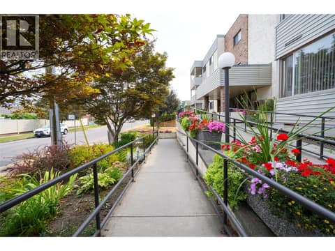 Front of Maple Grove Manor- with lovey flower beds maintained by residents. at 3608 27 Avenue Unit# 209, City of Vernon