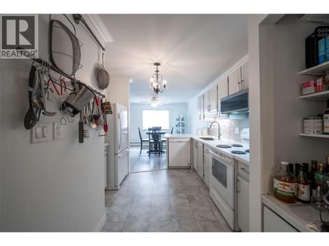 Kitchen looking towards dining area at 3608 27 Avenue Unit# 209, City of Vernon