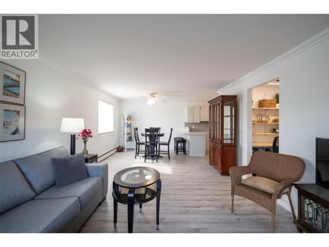 Living room looking towards dining area at 3608 27 Avenue Unit# 209, City of Vernon