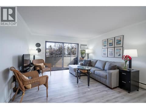 Living room with new floors/new ceilings in 2024 at 3608 27 Avenue Unit# 209, City of Vernon