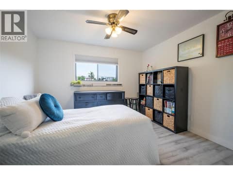 Primary bedroom with access to bathroom- at 3608 27 Avenue Unit# 209, City of Vernon