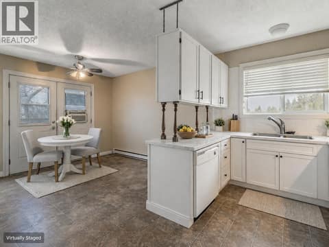 Virtually staged for to show potential at 1105 Cactus Road, Rutland South, Kelowna