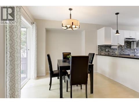 Dining room with access to back deck at 133 Wyndham Crescent Unit# 110, North Glenmore, Kelowna