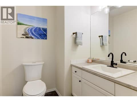 Powder room on the main level at 133 Wyndham Crescent Unit# 110, North Glenmore, Kelowna