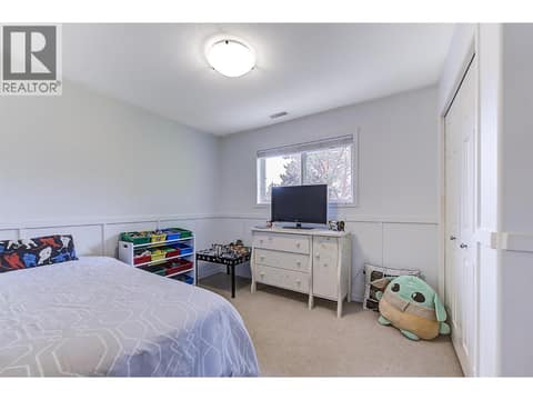 Second bedroom on upper level at 133 Wyndham Crescent Unit# 110, North Glenmore, Kelowna