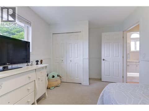 Second bedroom on upper level at 133 Wyndham Crescent Unit# 110, North Glenmore, Kelowna