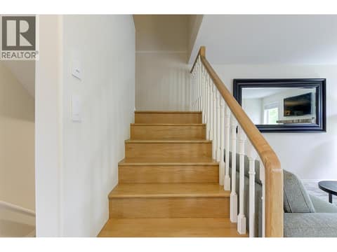 Stairs to the upper level at 133 Wyndham Crescent Unit# 110, North Glenmore, Kelowna