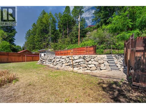 Still a decent amount of yard after construction! at 4535 Mill Road, Naramata Village