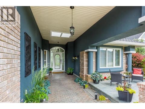 Exterior landscaping redone + front patio added at 4187 Gallaghers Crescent, South East Kelowna