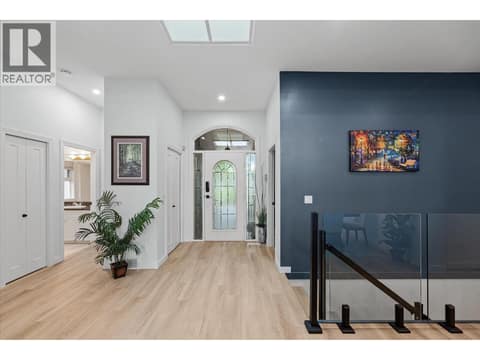 New flooring, new paint, and floor plan opened up at 4187 Gallaghers Crescent, South East Kelowna