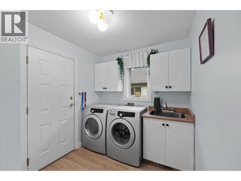 Upstairs laundry at 4187 Gallaghers Crescent, South East Kelowna