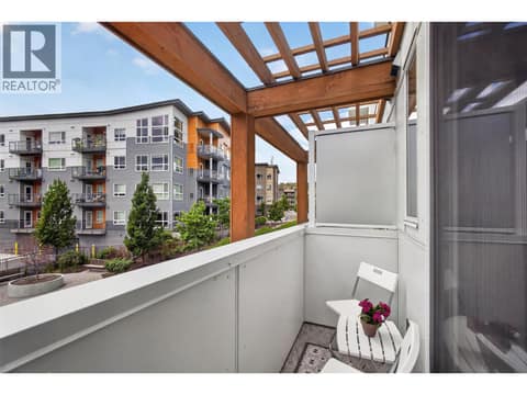 Balcony off the dining area, perfect for letting in a refreshing breeze and enjoying those warm Okanagan days. at 720 Valley Road Unit# 28, North Glenmore, Kelowna