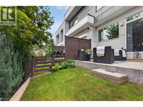 Private patio and yard space, perfect for BBQs, outdoor dining, entertaining guests, or letting kids and pets play. at 720 Valley Road Unit# 28, North Glenmore, Kelowna