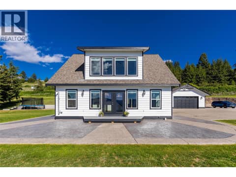 Cabin-inspired 3 bed/ 3 bath home with stunning views, a detached garage & plenty of usable land at 17936 Angus Road, Lake Country North West