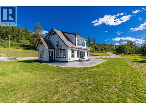 Cabin-inspired 3 bed/ 3 bath home with stunning views, a detached garage & plenty of usable land at 17936 Angus Road, Lake Country North West