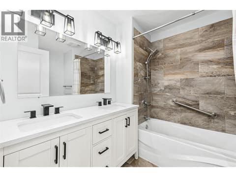 Primary Bathroom | Main Level - 5 piece ensuite with double vanities at 17936 Angus Road, Lake Country North West