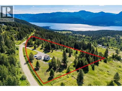 Situated on a 9.5 acre lot with tons of useable land, a gated entrance, garden beds, tons of parking including RV parking, and endless potential for recreation or hobby use! at 17936 Angus Road, Lake Country North West