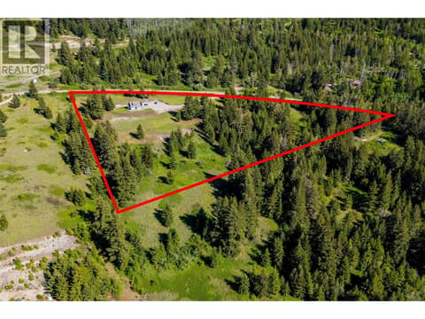Situated on a 9.5 acre lot with tons of useable land, a gated entrance, garden beds, tons of parking including RV parking, and endless potential for recreation or hobby use! at 17936 Angus Road, Lake Country North West