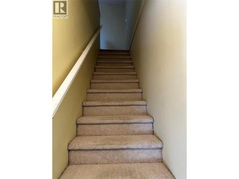 Stairway to Bonus Room at 880 Christina Place Unit# 21, Dilworth Mountain, Kelowna