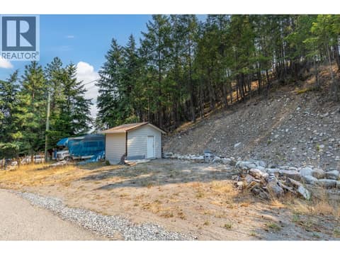 Bottom of the property has a storage shed and room to park a boat or rv at 10818 Westshore Road, Okanagan North, Vernon