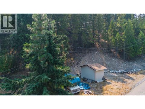 Bottom of the property has a shed and room to park a boat or rv at 10818 Westshore Road, Okanagan North, Vernon