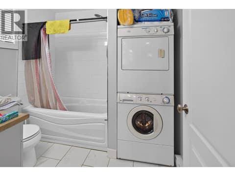 Lower level bath and laundry at 10818 Westshore Road, Okanagan North, Vernon