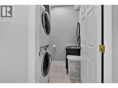Main level laundry at 10818 Westshore Road, Okanagan North, Vernon