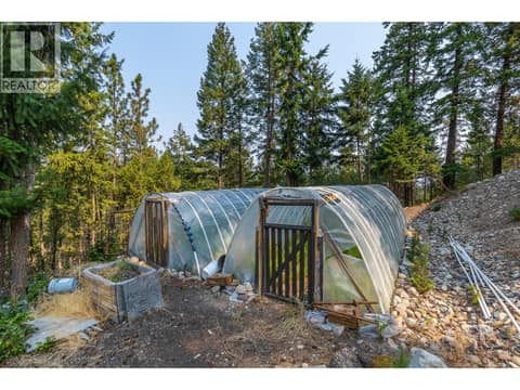 Middle of the  property has greenhouses at 10818 Westshore Road, Okanagan North, Vernon
