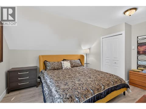 Upper level bedroom at 10818 Westshore Road, Okanagan North, Vernon