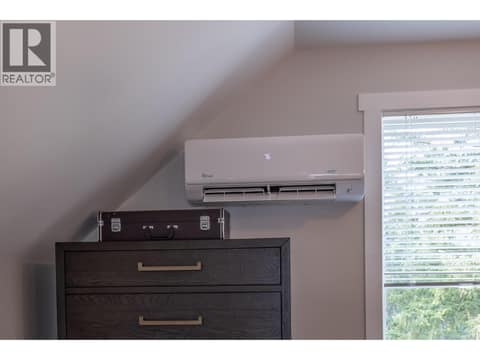 Upper level has electric baseboard and a heat pump head at 10818 Westshore Road, Okanagan North, Vernon