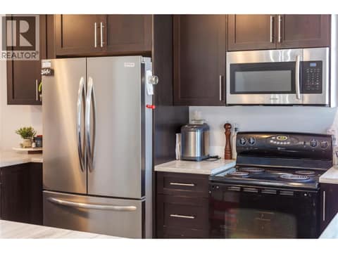Electric stove in photo has since been upgraded at 42 Lakeshore Drive, Okanagan North, Vernon