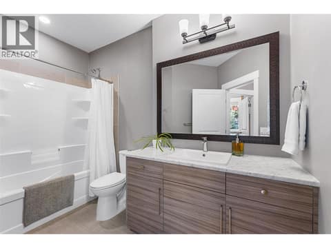 Full Bath Main Level at 8819 Heritage Drive, Lake Country South West