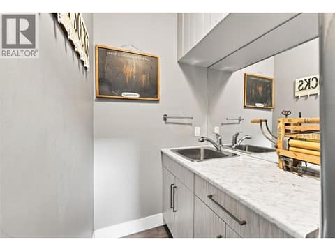 Main house laundry room at 8819 Heritage Drive, Lake Country South West