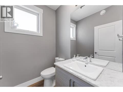 Powder Room Lower Level, connected to Main house at 8819 Heritage Drive, Lake Country South West