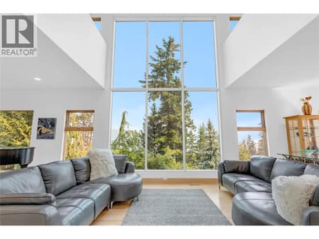 Floor-to-Ceiling Windows with gorgeous lake views at 5851 Lakeshore Road, Upper Mission, Kelowna