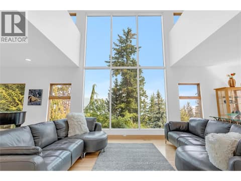 Floor-to-Ceiling Windows with gorgeous lake views at 5851 Lakeshore Road, Upper Mission, Kelowna