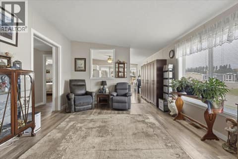 Large living room, also freshly painted with new trim! at 12560 Westside Road Unit# 77, Swan Lake West, Vernon