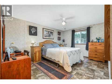 Primary bedroom at 12560 Westside Road Unit# 77, Swan Lake West, Vernon