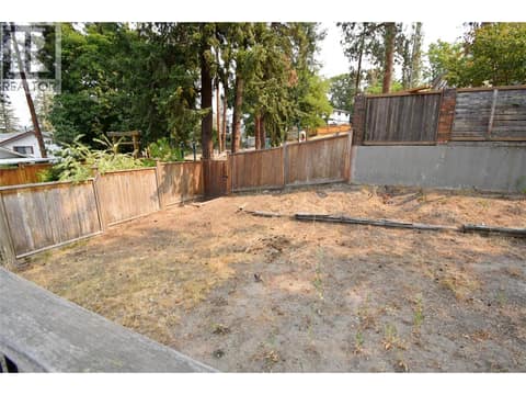 Different views of the fenced back yard at 3907 17 Street, East Hill, Vernon
