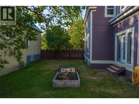 Side yard  =Private at 408 & 410 Mackenzie Avenue, Revelstoke
