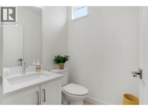 Powder room on main floor at 720 Valley Road Unit# 46, North Glenmore, Kelowna