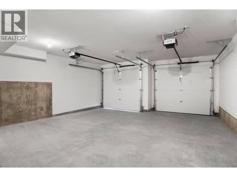 Side-by-side garage with room for a large truck at 720 Valley Road Unit# 46, North Glenmore, Kelowna