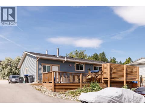 Exterior Back of Main home at 3728 - 3724 Glenway Road, Glenrosa, West Kelowna